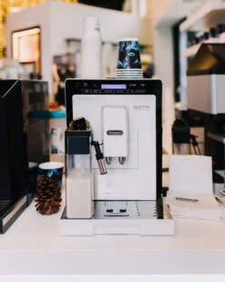 Refurbished DeLonghi Eletta Cappuccino In White ECAM44660W -Coffee Promotion Shop delonghi social lifestyle eletta white coffee n clothes event all rights jan 2099